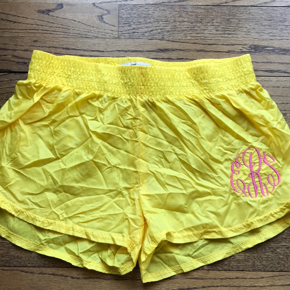 Soffe yellow windshorts with pink ESR monogram